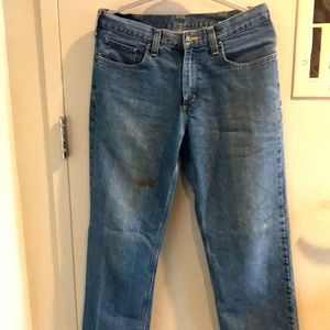 Carhartt jeans, worn but still have a lot of life left in them. Stains/tears